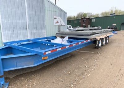 Here is a bi-fold door on this trailer that we blasted, primed, and powder coated 01
